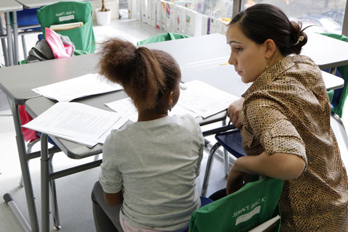 Teacher Helping Student