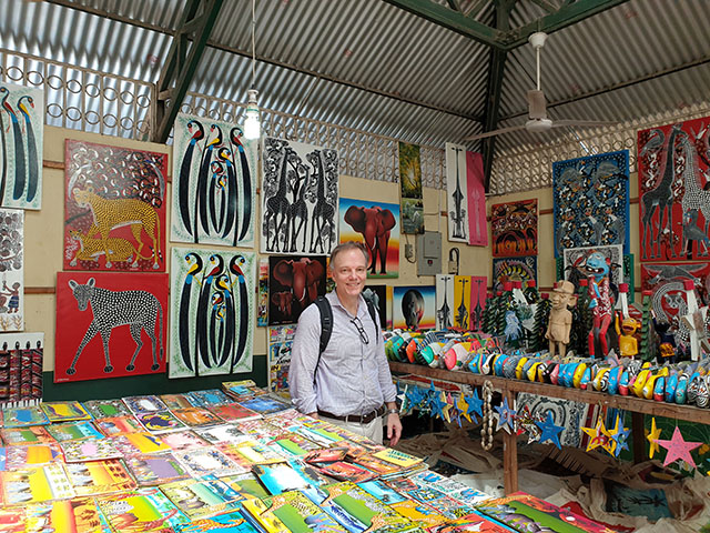 Paul during a visit to public market in Dar.