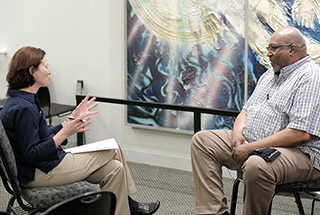 Holcomb interviews Stan Hill, a former manager at Urban Ventures