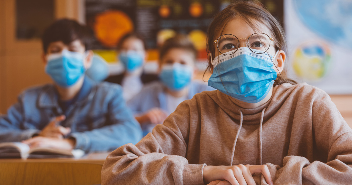 Students in classroom wearing masks