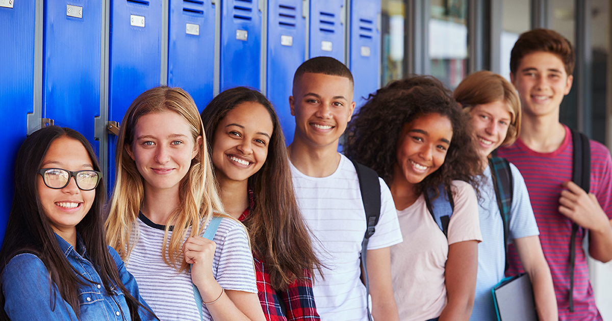 Students at school in front of lockers