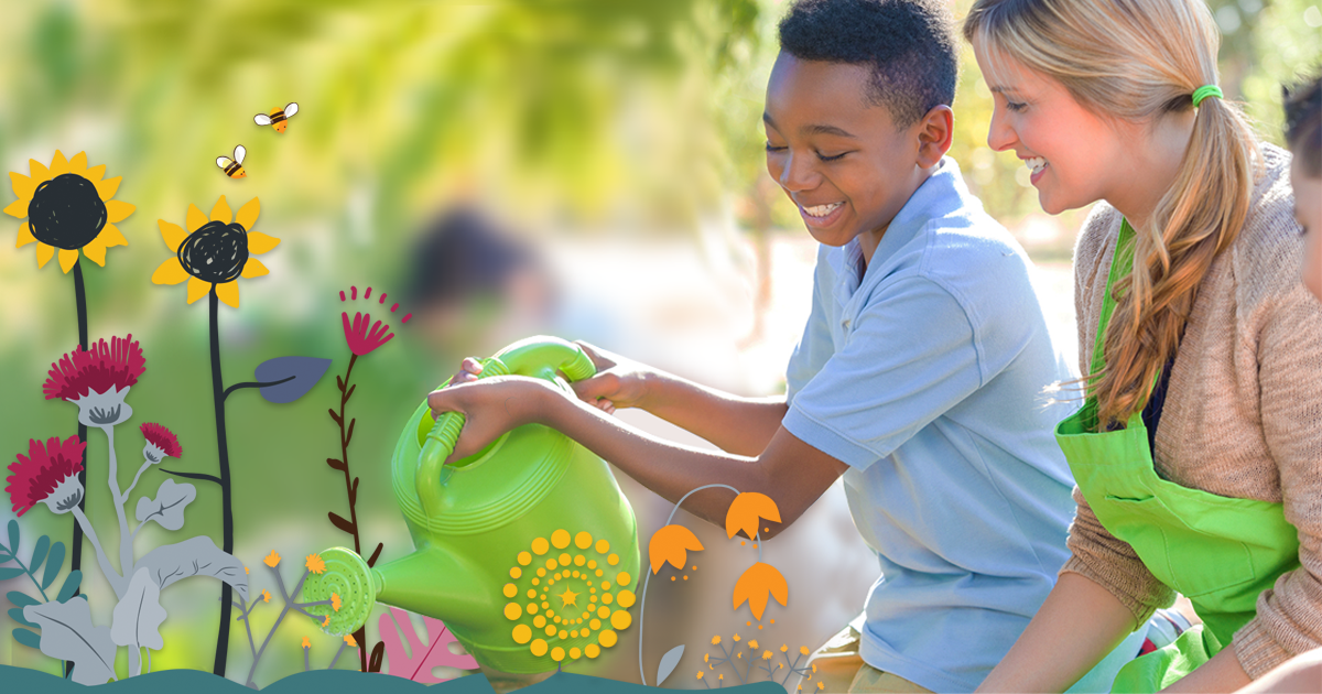 Young child watering plants