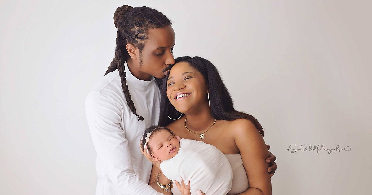 Kiana and her husband after their daughter Kris was born.