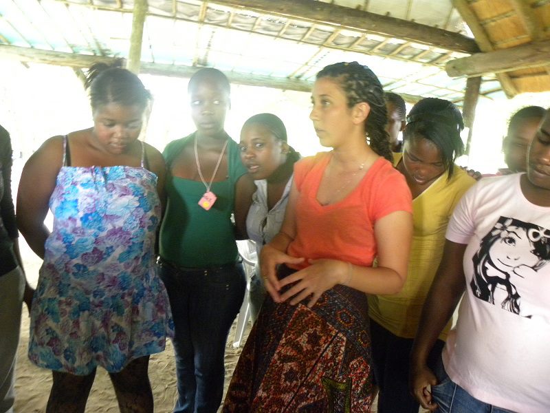 Ryan Ruggiero facilitates a goal setting session with youth during the 3-day Camp GLOW (Girls Leading Our World) she organized while in rural South Africa.