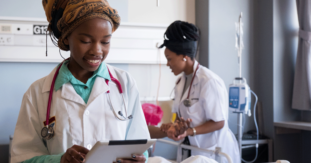 Nurse reviewing patient chart