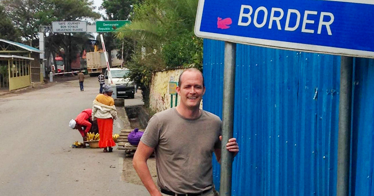 Chris at the DRC/Rwanda Border in September 2015 en route to Goma, DRC