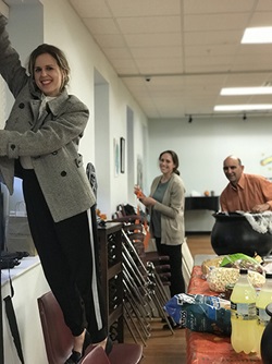 HomeFront volunteers decorating for Halloween