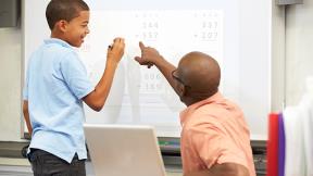 male teacher with student