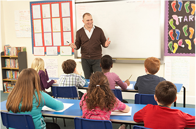 School children in classroom with teacher