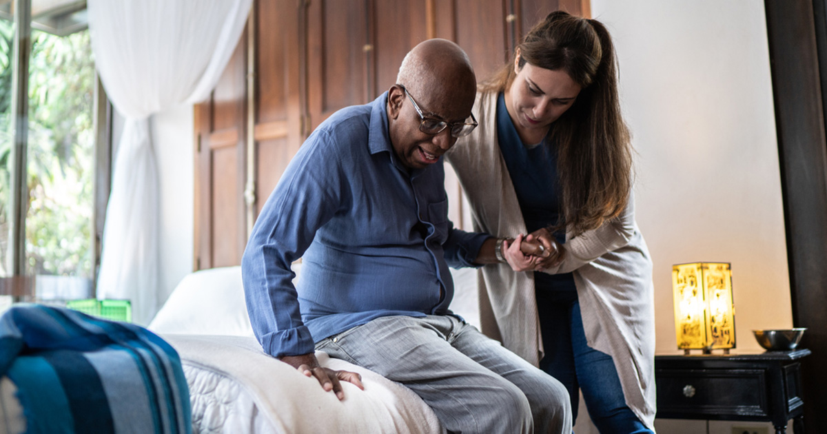 Caregiver assisting a patient