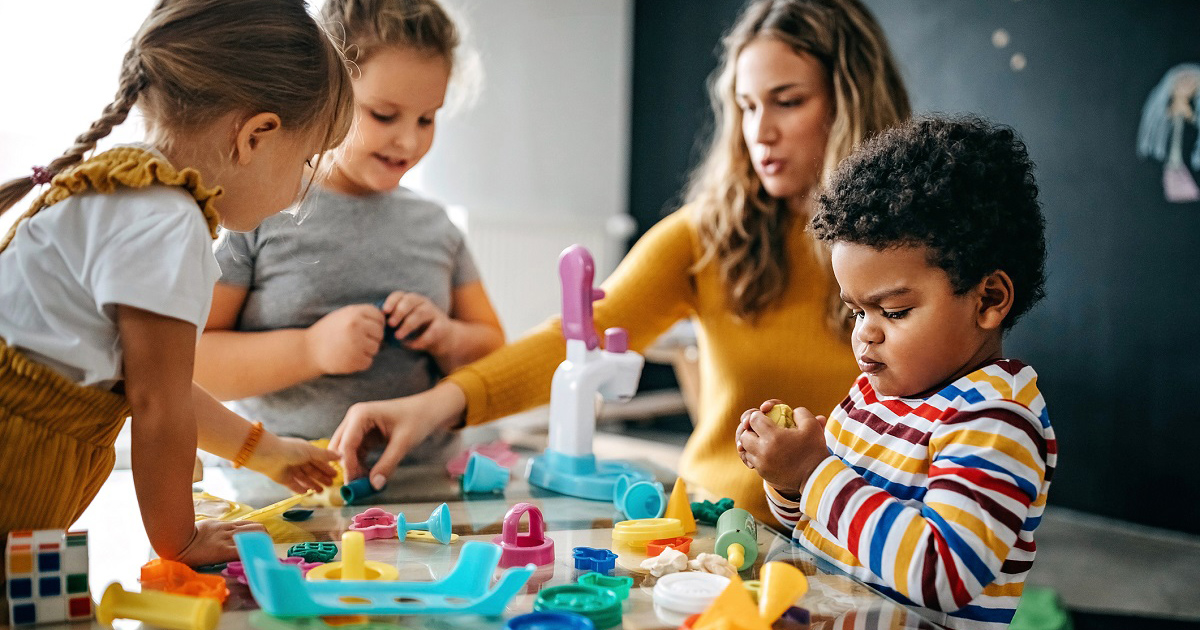 a group of kids playing with toys