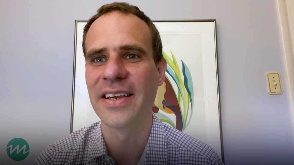 Screenshot of a person speaking into the camera.