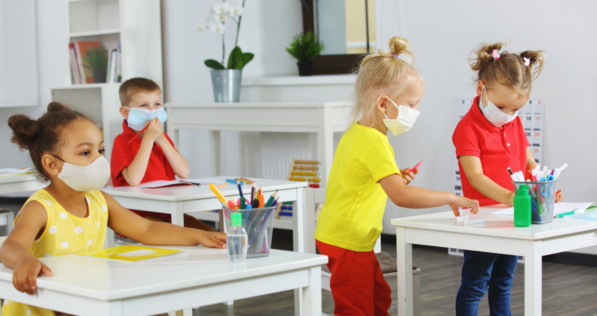 Elementary students in class with masks