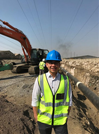Paolo inspects new pipes being connected to the water network.
