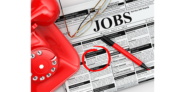 Search for Job advertisement with glasses and phone Search for Job advertisement with glasses and phone