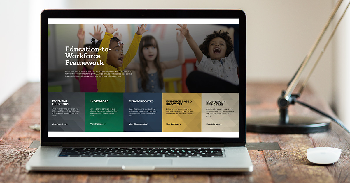 A laptop computer screen display the Education-to-Workforce Indicator Framework website