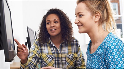 Women looking at computer