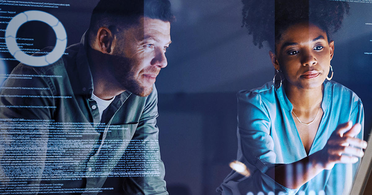 Man and woman looking at data and evidence on a computer screen