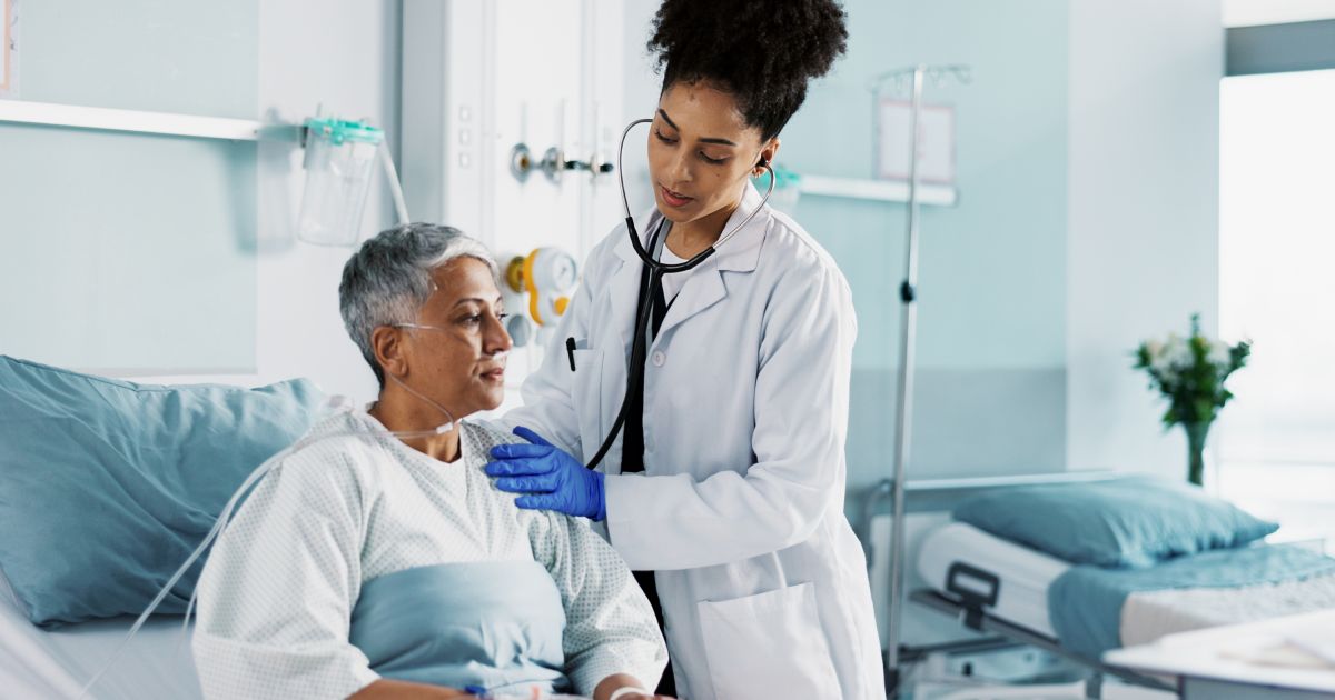 Hospital, doctor and woman breathing with stethoscope for diagnosis, medical service and checkup