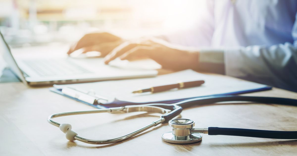 A stethoscope on a desk. 