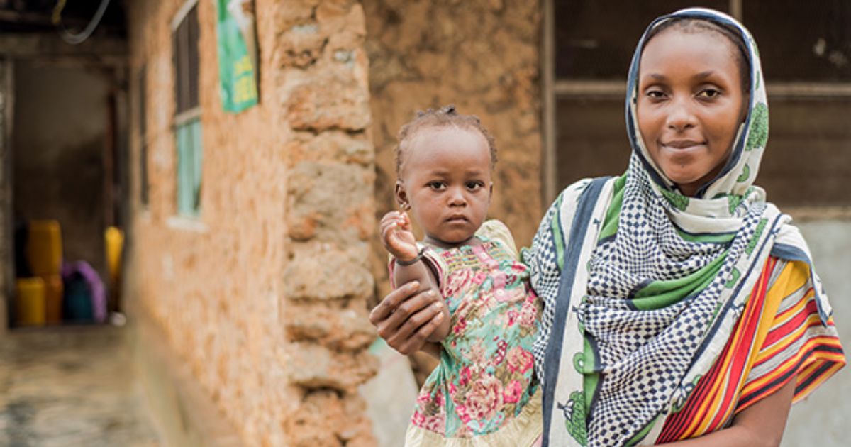 A woman with her child. 