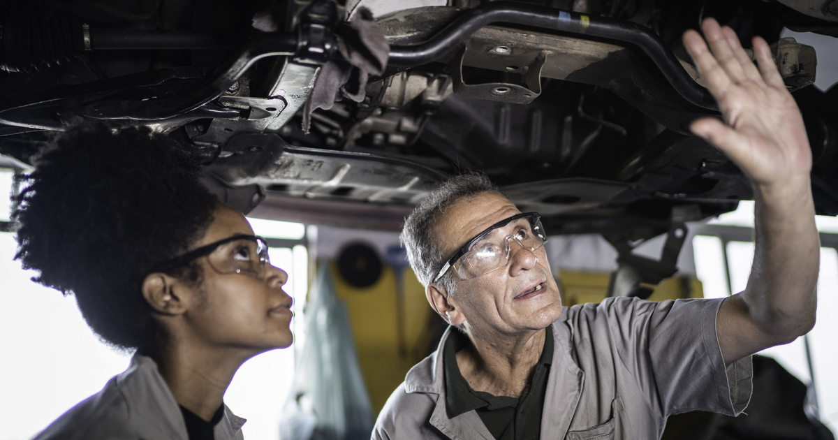 a person and person looking up at a car