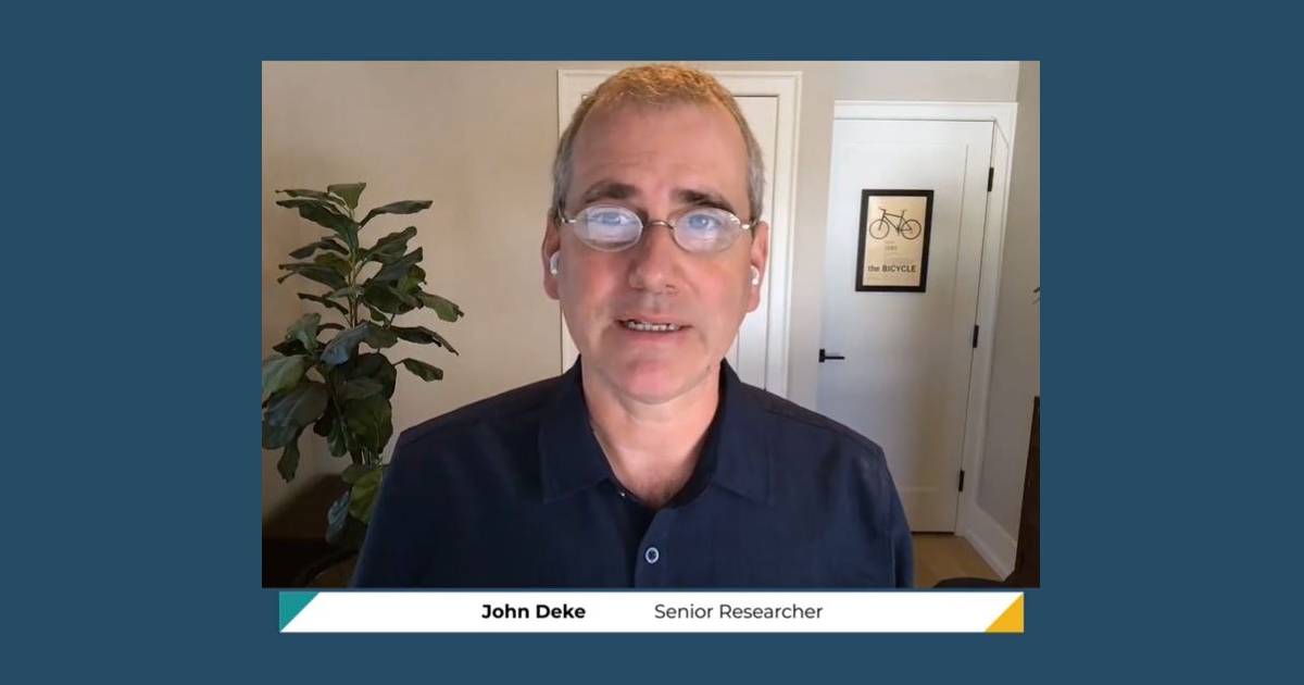 Screenshot of John Deke speaking on video
